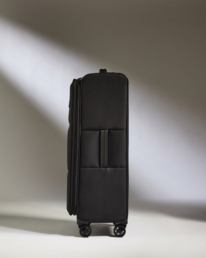 a black suitcase with wheels