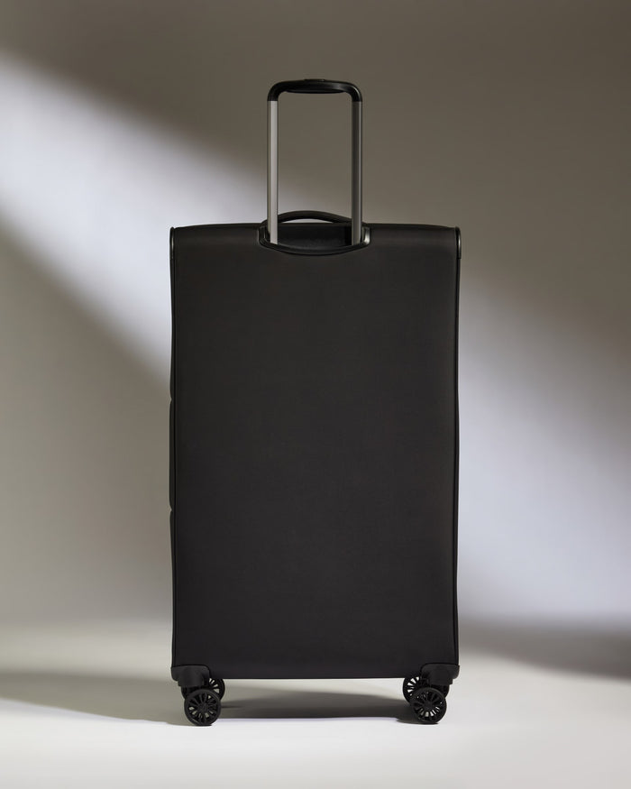 a black suitcase with wheels