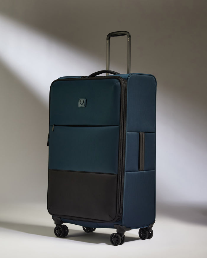a blue and black suitcase