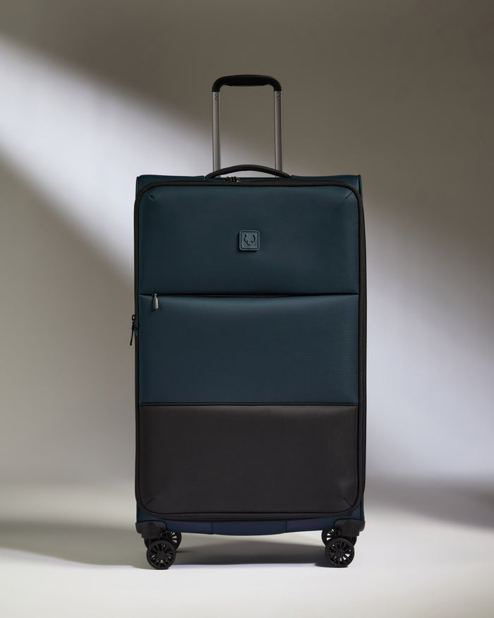 a blue and black suitcase