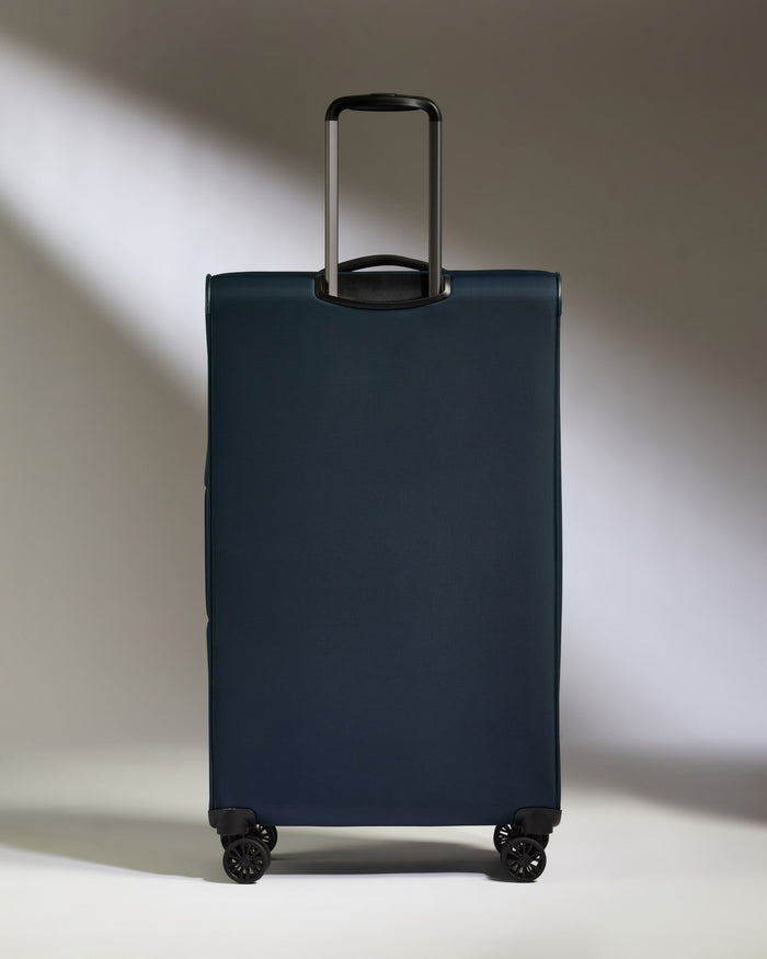 a blue suitcase with wheels