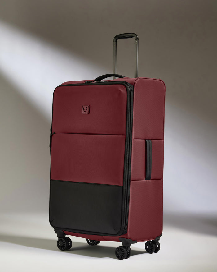 a red and black suitcase