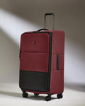 a red and black suitcase
