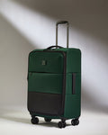 a green and black suitcase