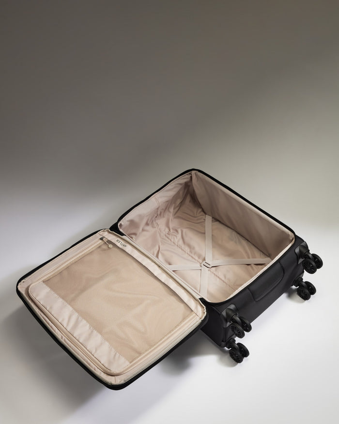 a suitcase with wheels and a lid