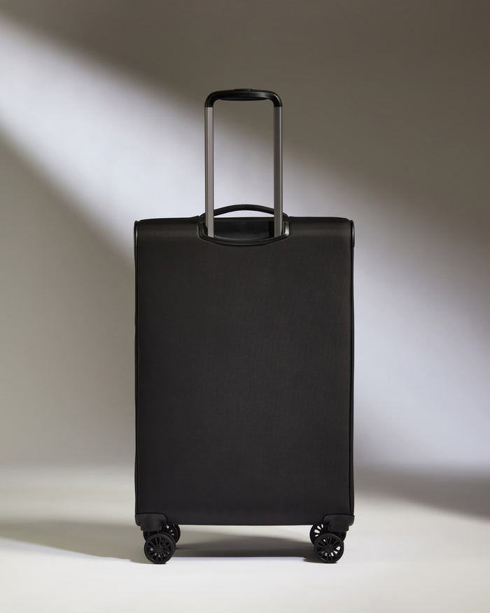 a black suitcase with wheels