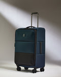 a blue suitcase with wheels