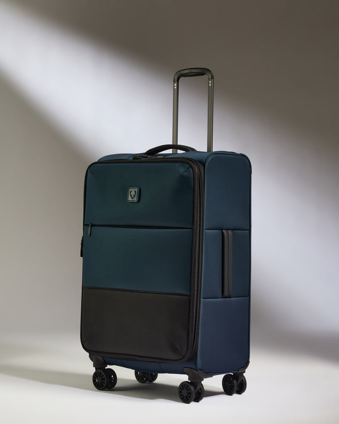 a blue suitcase with wheels