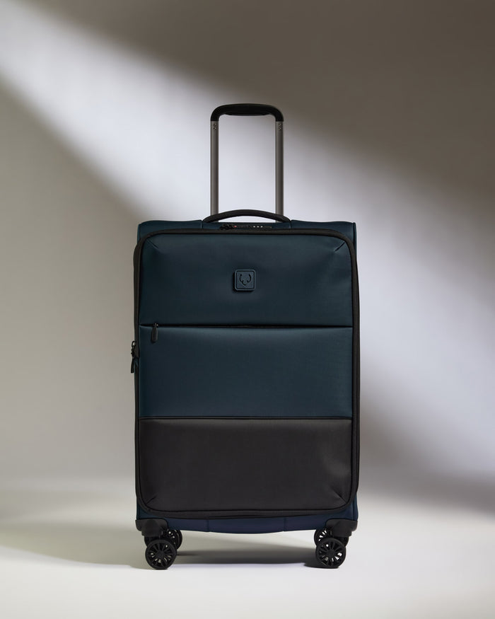 a suitcase with wheels and handle