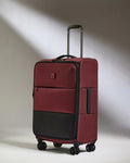 a red and black suitcase