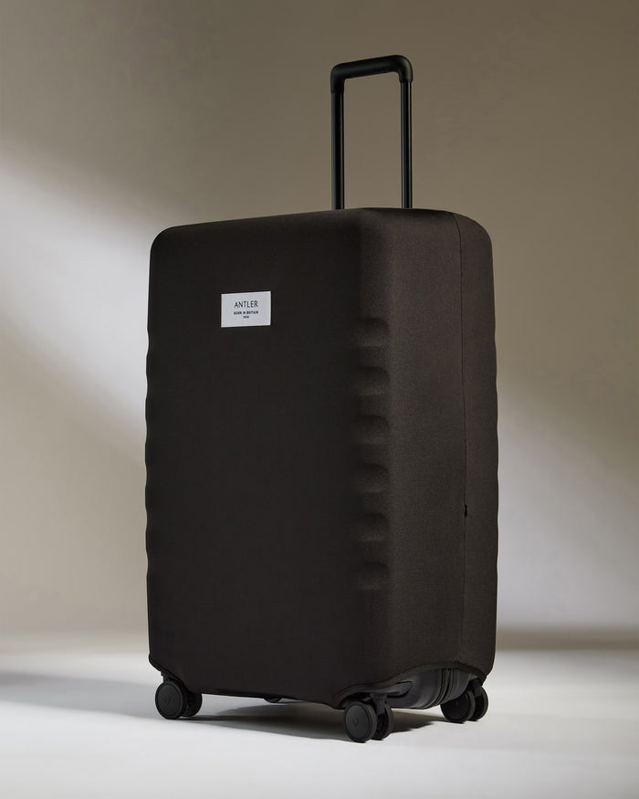 a black suitcase with two handles