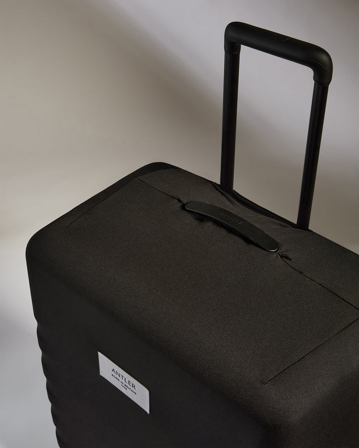 a black suitcase with handle