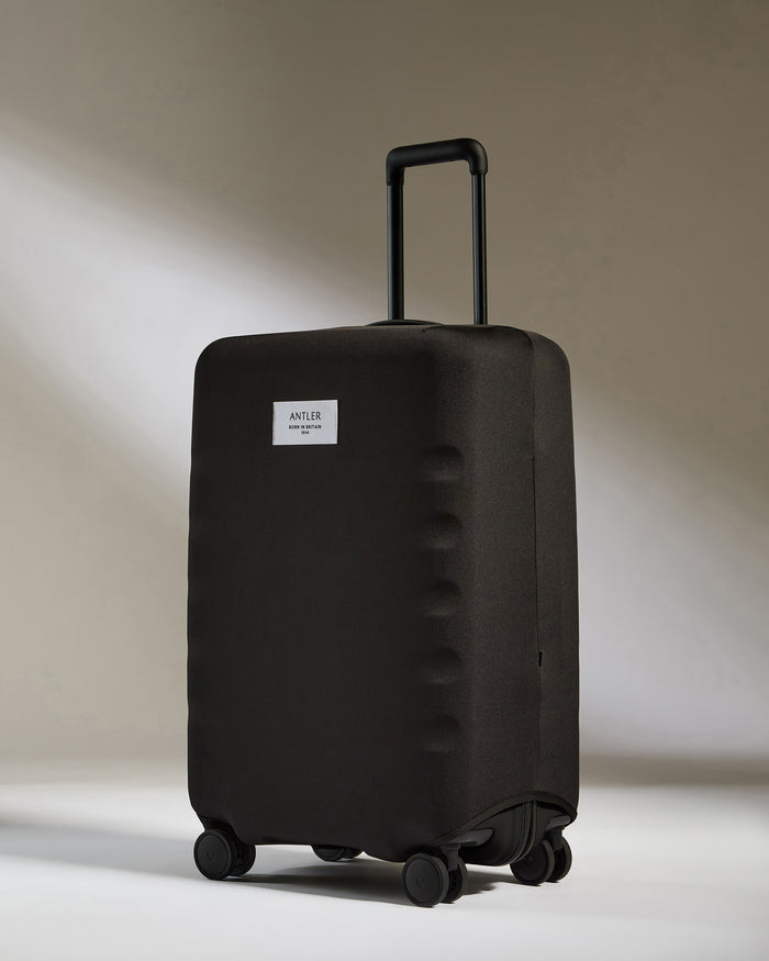 a black suitcase with wheels