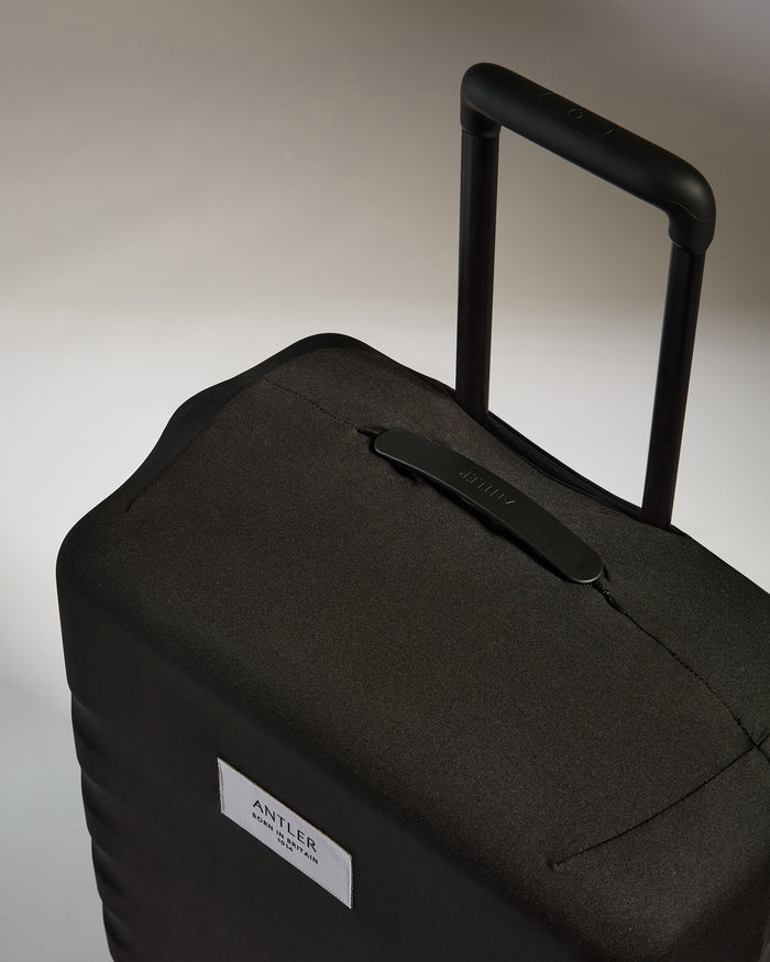 a black suitcase with handle