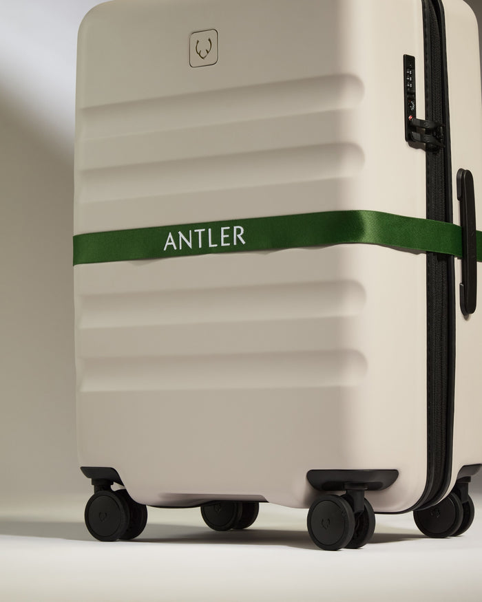 a luggage with a green band