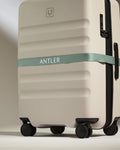 a luggage with a band around it