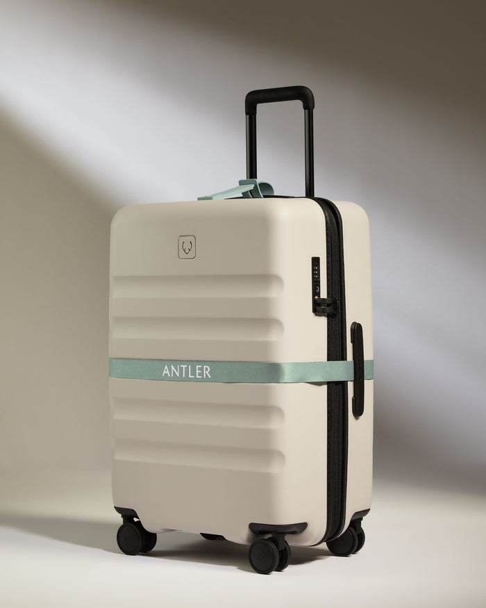 a luggage with a tape around it