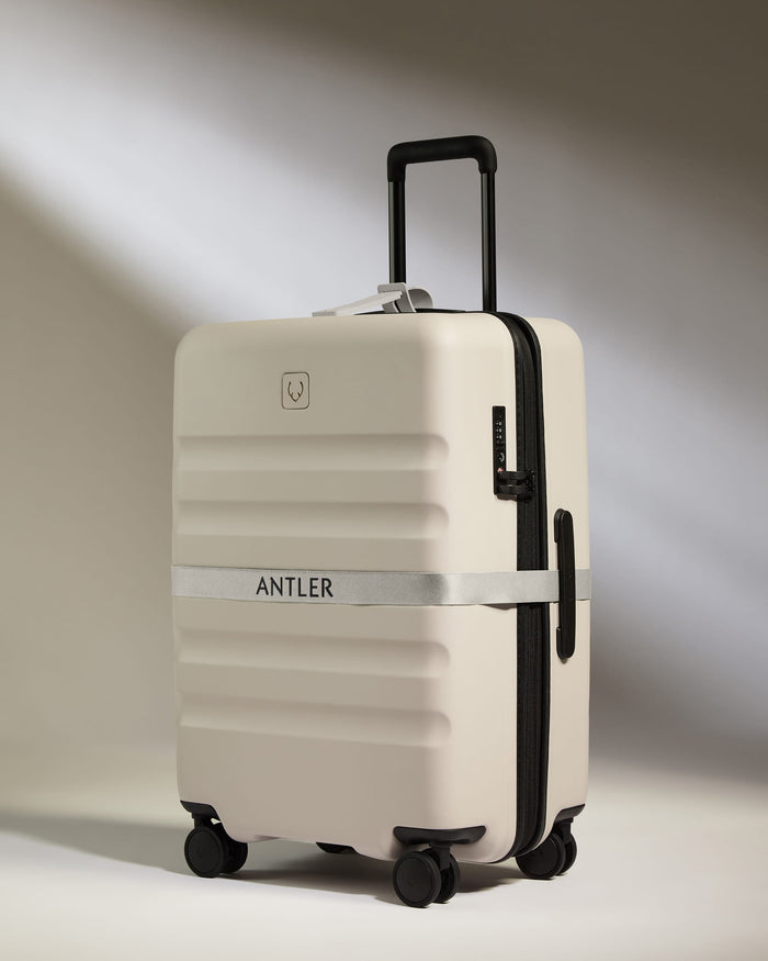 a luggage with a tape around it