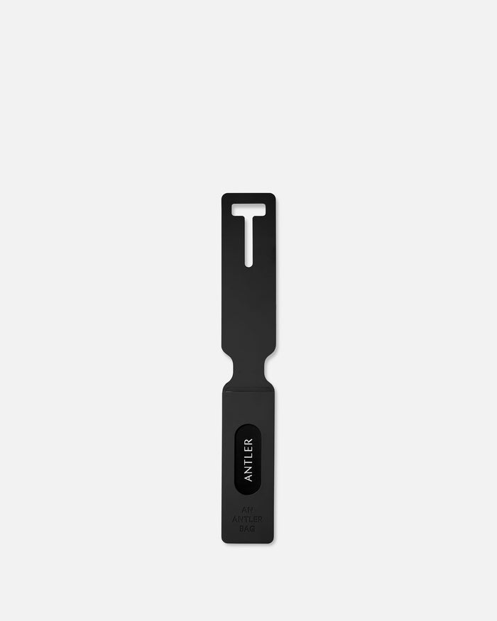 a black rectangular object with a hole in it
