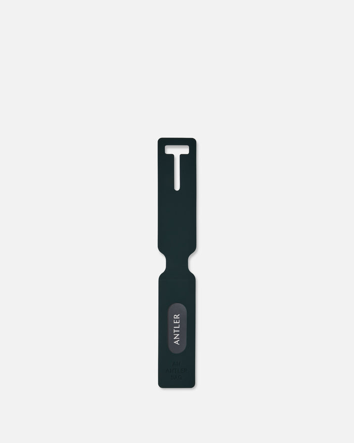 a black plastic tool with a white text