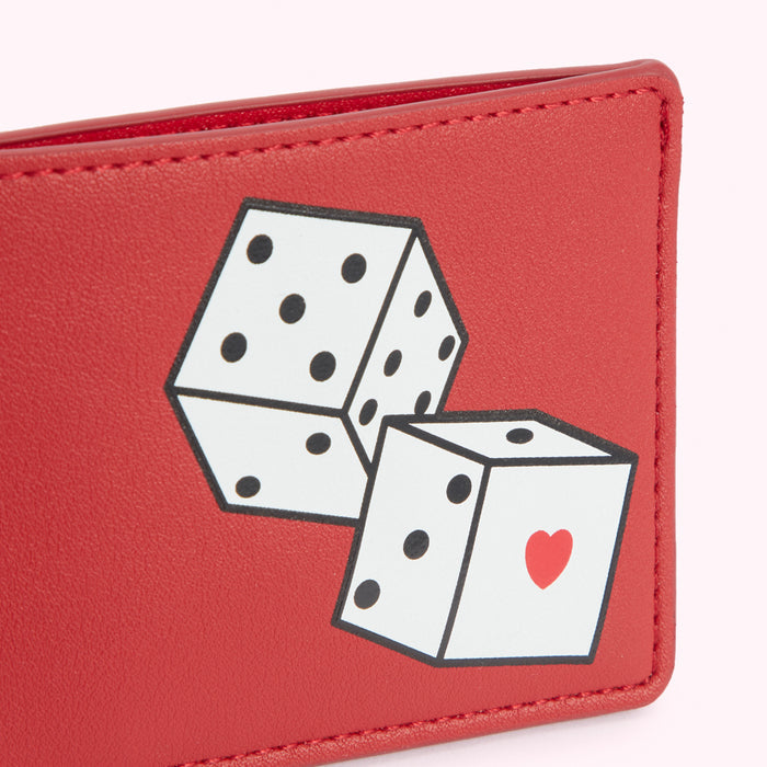 Red leather cardholder with a graphic of two dice; one die has a red heart.