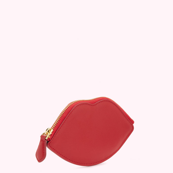Red lip-shaped coin purse with gold zipper.
