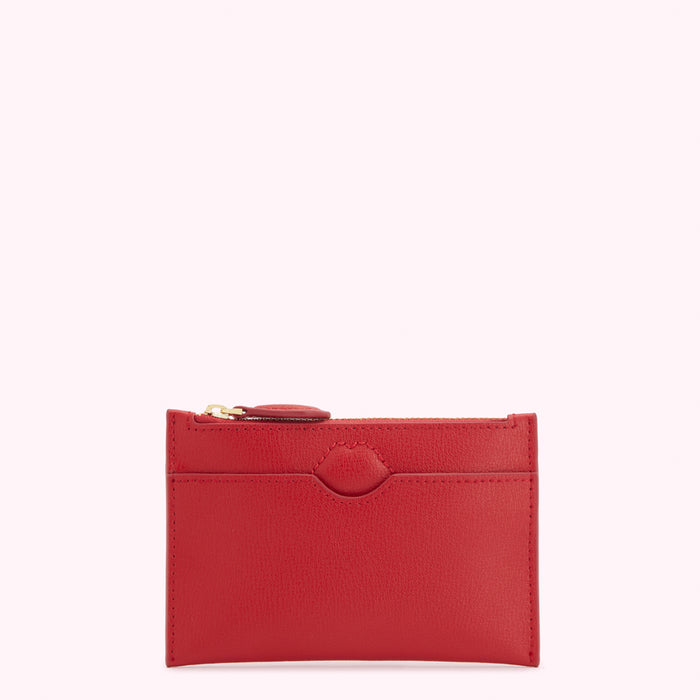Red leather zip-around wallet against a white background.