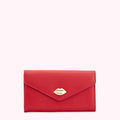 Red leather wallet with gold lip detail.