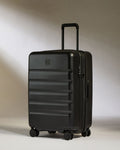 a black suitcase with wheels