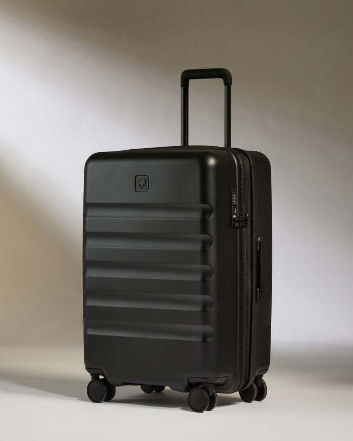 a black suitcase with wheels