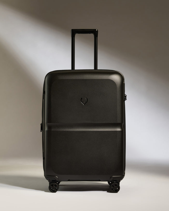 a black suitcase with wheels