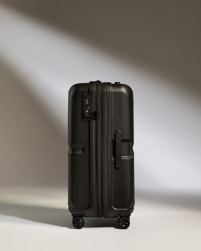 a black suitcase with wheels