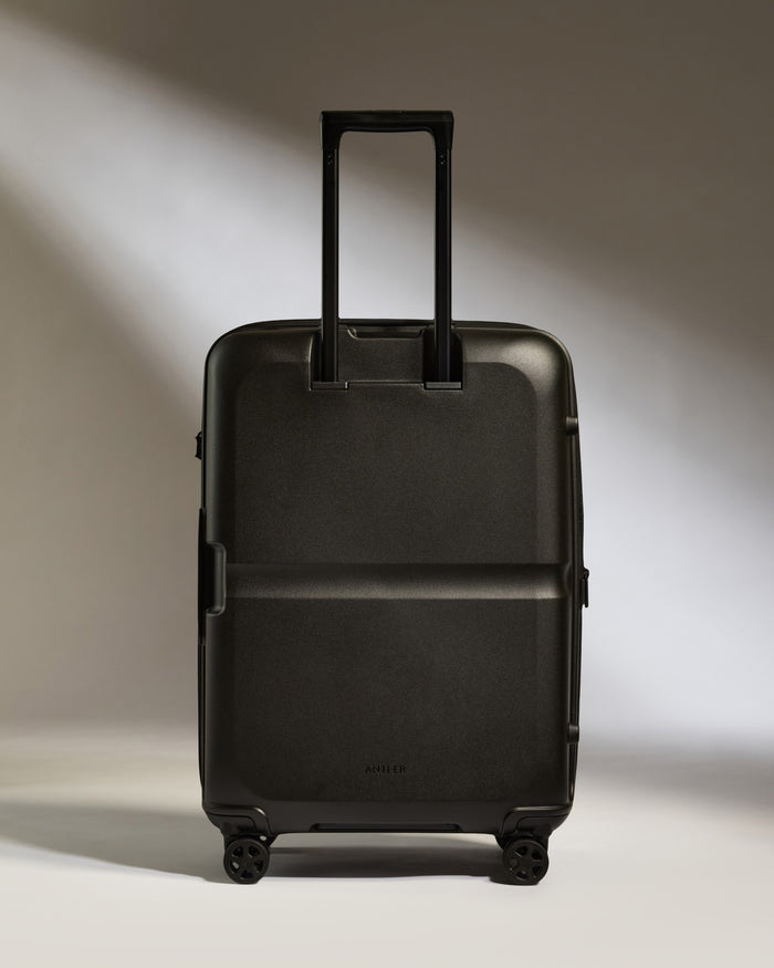 a black suitcase with wheels