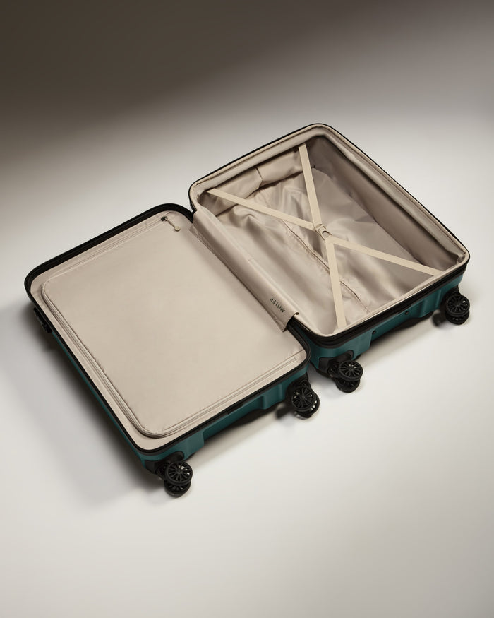 a suitcase with wheels and a lid