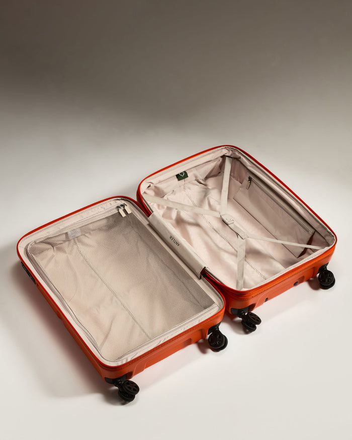 an open suitcase with wheels