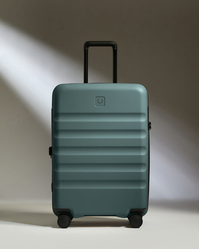 a suitcase with wheels and handle
