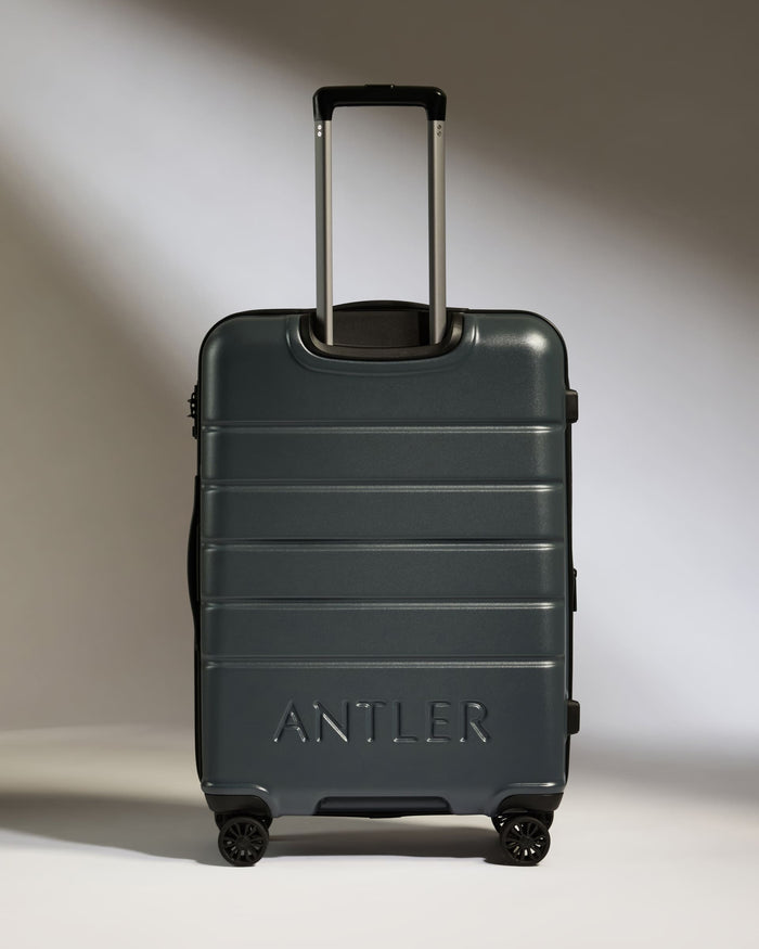 a suitcase with handle on wheels