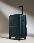 a blue suitcase with wheels