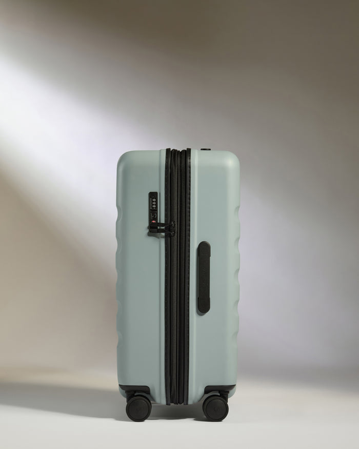 a suitcase with wheels on it
