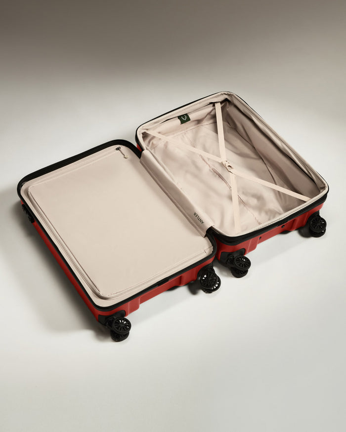a suitcase with wheels and a lid