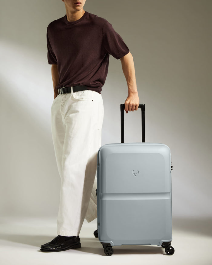 a man with a suitcase