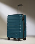 a blue suitcase with wheels