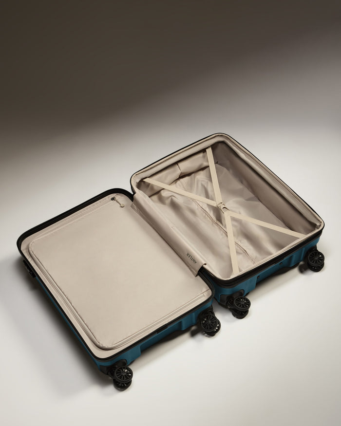a suitcase with wheels and a lid
