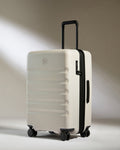 a white suitcase with wheels