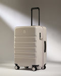 a white suitcase with wheels