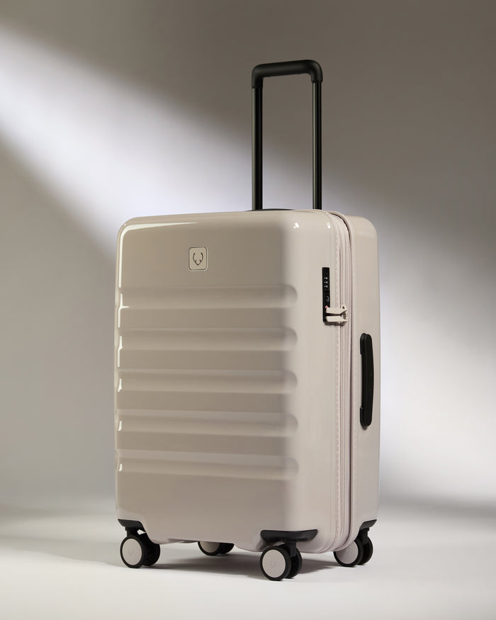 a white suitcase with wheels