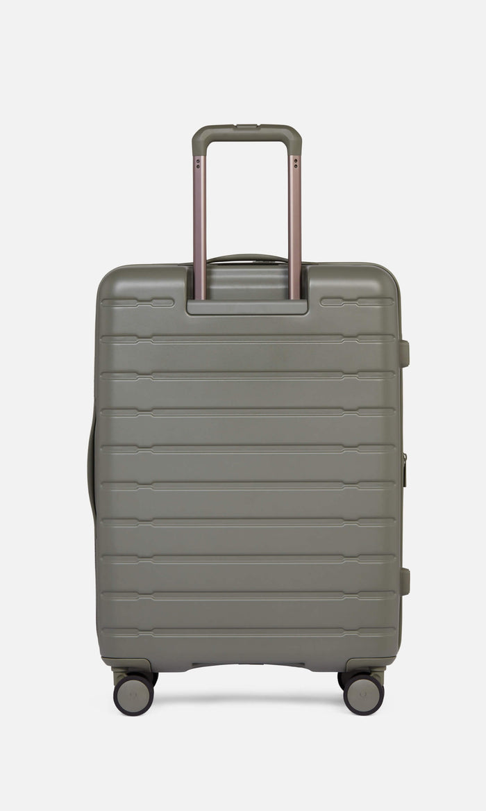 a grey suitcase with handles