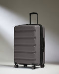 Antler Luggage -  Expandable Medium Suitcase in Gloss Gull Grey - Logo Stripe - Expanding Rollercase | Medium 4W Expandable Medium Suitcase in Gloss Gull Grey - Logo Stripe