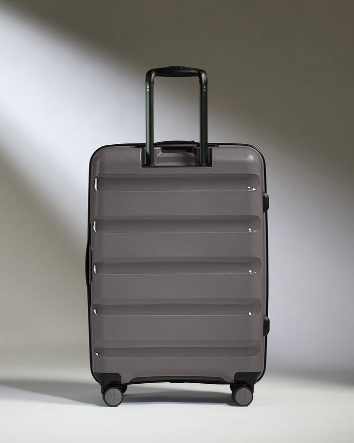 Antler Luggage -  Expandable Medium Suitcase in Gloss Gull Grey - Logo Stripe - Expanding Rollercase | Medium 4W Expandable Medium Suitcase in Gloss Gull Grey - Logo Stripe