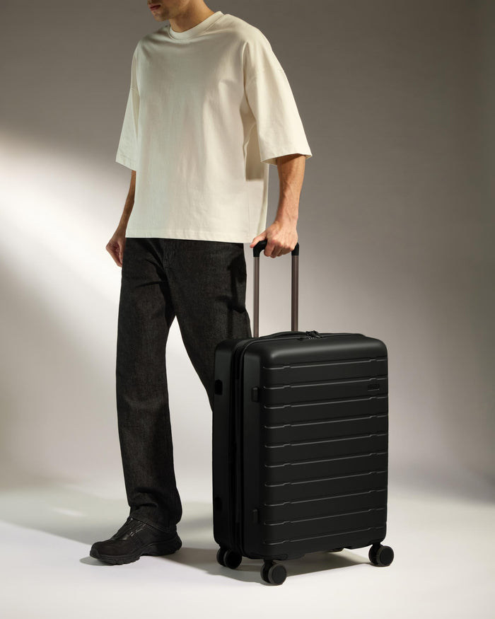 a man with a suitcase